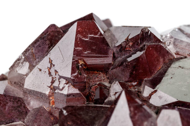 istock Macro mineral stone Amethysts, Goethite, Epidote on a white background 1129441585