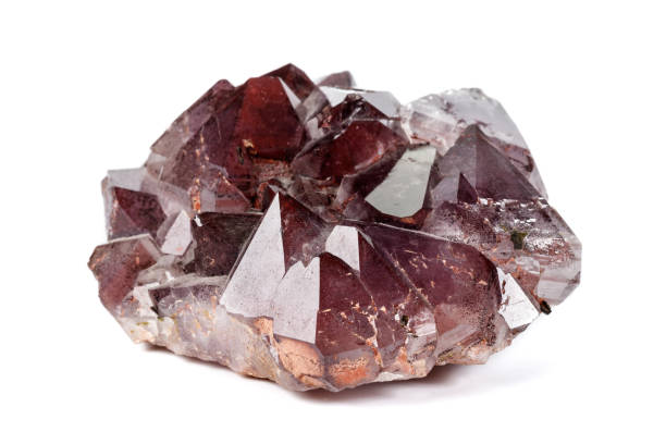 istock Macro mineral stone Amethysts, Goethite, Epidote on a white background 1129441626