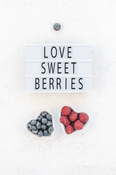 istock Valentine Day composition berries in heart plates 1129442249