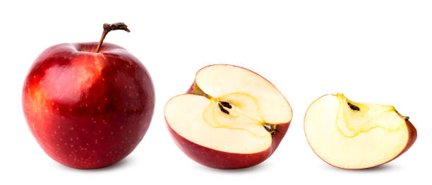 istock Ripe red Apple, half and piece on a white, isolated. 1129445688