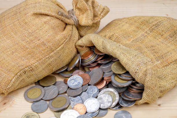 istock High Angle View Of Coins On Table 1129447392