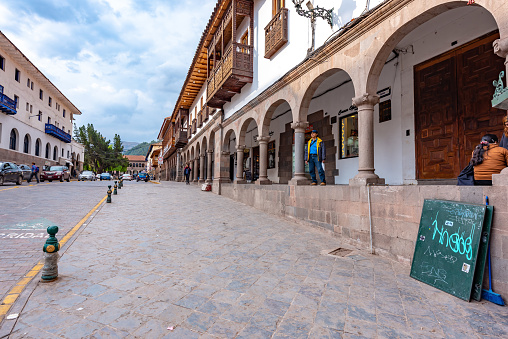 Cusco, Peru - October 17, 2018: Plaza de Armas, the town center of the city of Cusco, Peru. Tourists walking around the busy square.