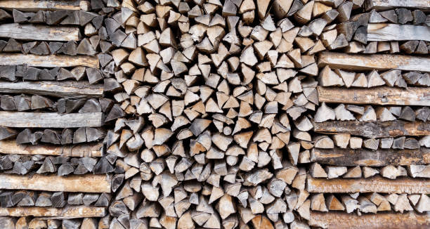 istock Stacked stock of firewood 1129449981