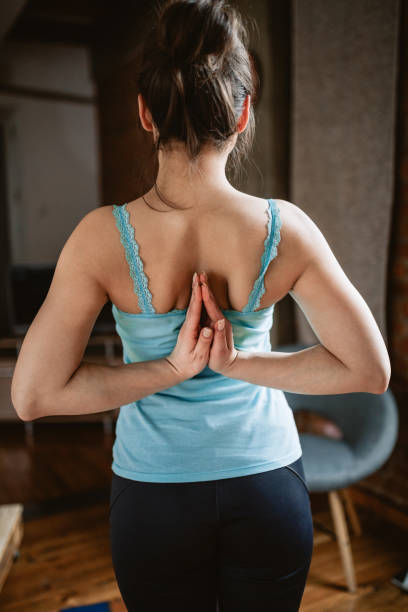 istock Relaxing with yoga at home 1129451356