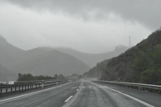 istock Rainy road  in the nature 1129453409