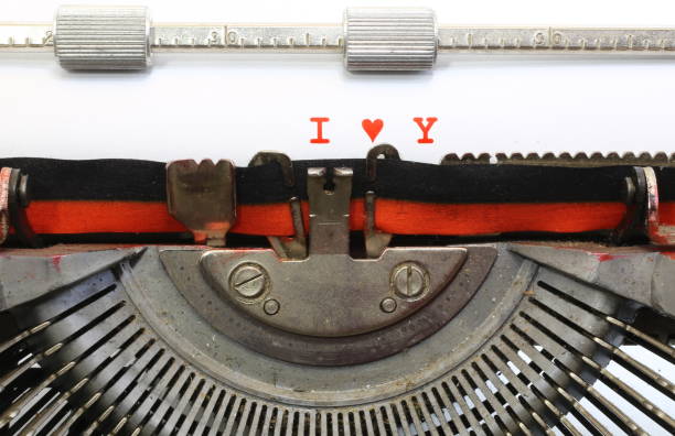 text by typewriter I Love You with red ink with vintage toned ef