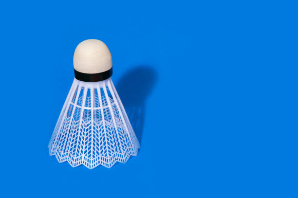 istock High Angle View Of Shuttlecock On Blue Background 1129455465
