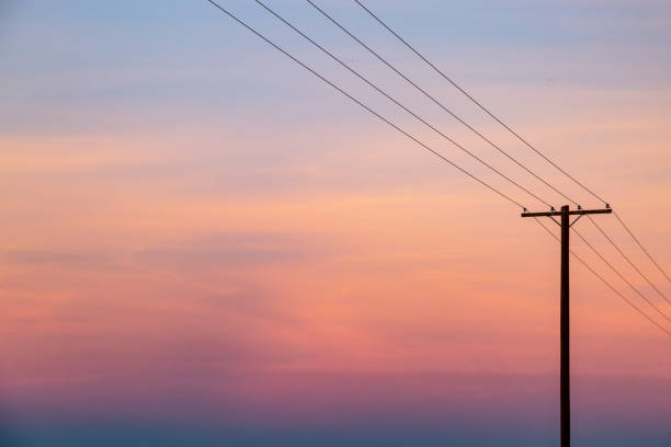 A Californian Sunset A Telegraph Pole at Sunset, in California telephone pole stock pictures, royalty-free photos & images