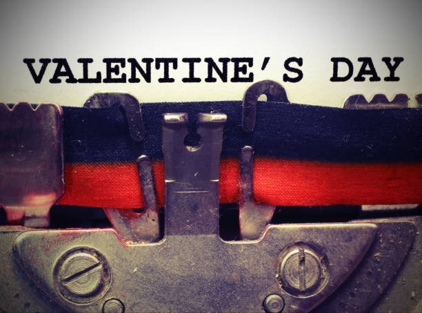 istock text by typewriter Valentines Day in black ink with vintage tone 1129455638