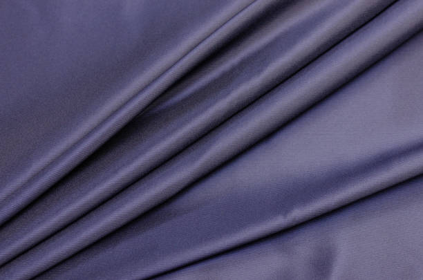 istock Lining fabric of viscose, acetate and elastane blue 1129458186