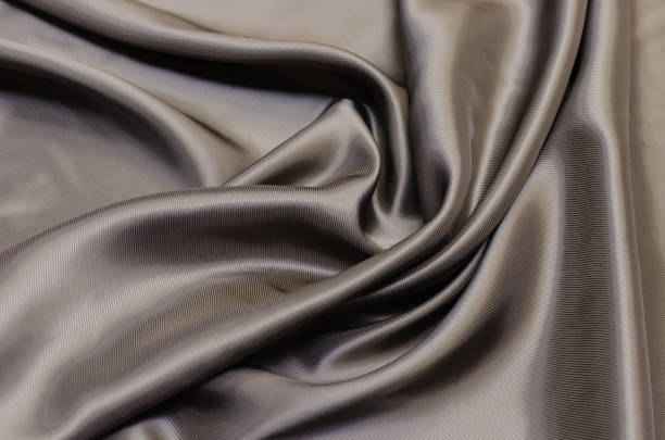istock Lining fabric of viscose acetate and elastane gray 1129458212