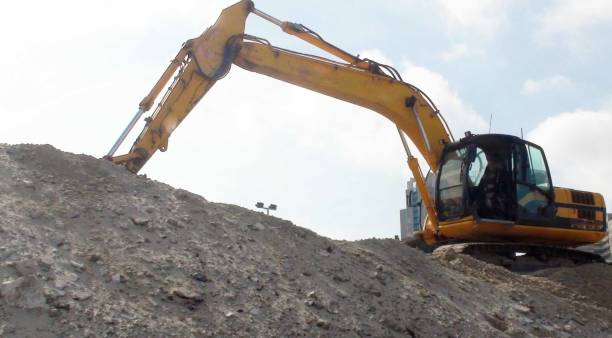 istock Bulldozer Construction Machinery Against Sky View During The Day 1129459544