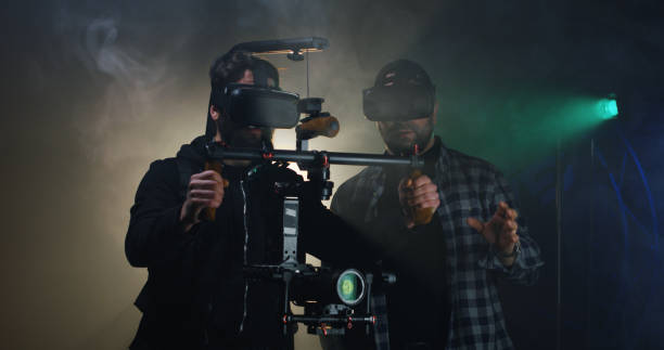 istock Director instructing a cameraman on a film set 1129464252