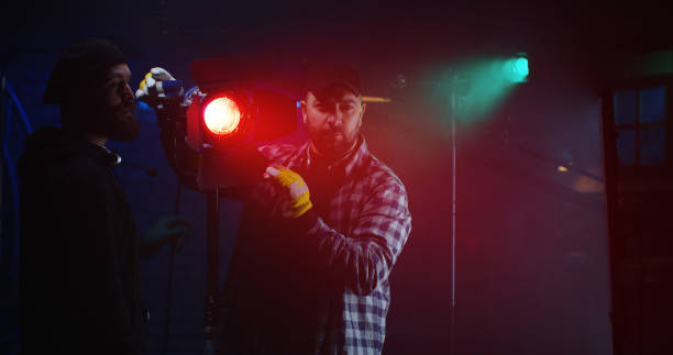 istock Film crew using a Fresnel lamp 1129464279