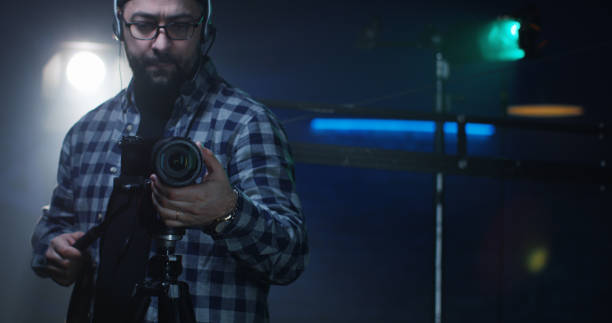 istock Young director giving instructions on a film set 1129464316