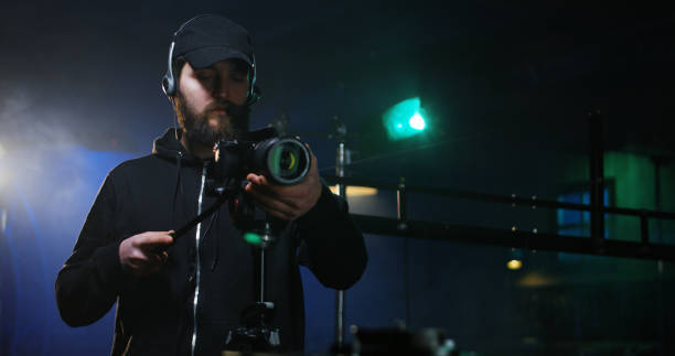 istock Film crew shooting take of scene in studio 1129464337