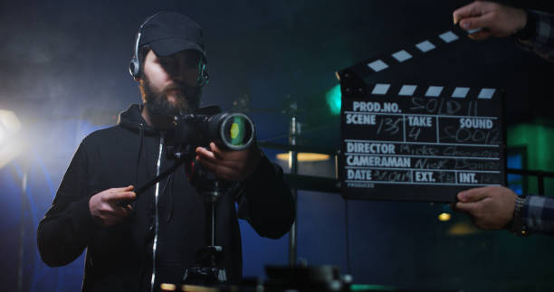 istock Film crew shooting take of scene in studio 1129464338