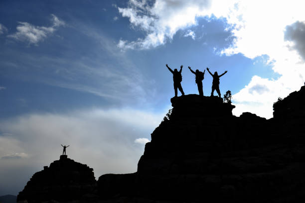 istock mountaineering diary and successful leader team 1129467129