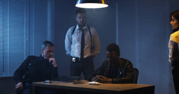 istock Police examining black man about drugs 1129468303
