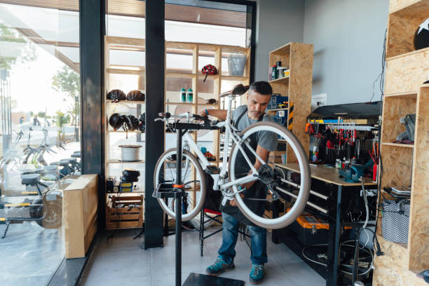 Bicycle repair Bicycle repair bicycle shop stock pictures, royalty-free photos & images