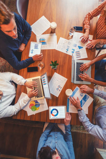 istock Group of people meeting with technology. 1129473241