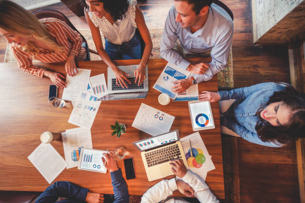 istock Group of people meeting with technology. 1129473243