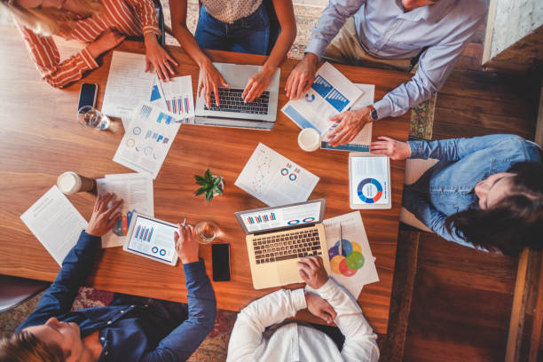 istock Group of people meeting with technology. 1129473245