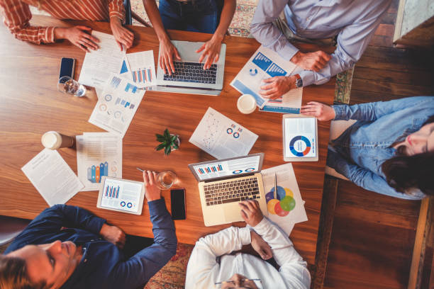 istock Group of people meeting with technology. 1129473246