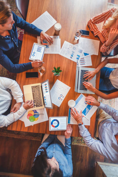 istock Group of people meeting with technology. 1129473249