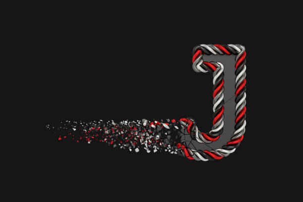 istock Shattering letter J 3D raster illustration. Twisted letter with explosion effect on dark background. Isolated design element. 1129473773