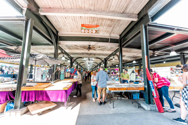 Old town French Quarter outdoor flea market entrance inside in Louisiana famous town city during day shopping New Orleans, USA - April 23, 2018: Old town French Quarter outdoor flea market entrance inside in Louisiana famous town city during day shopping 11904 stock pictures, royalty-free photos & images