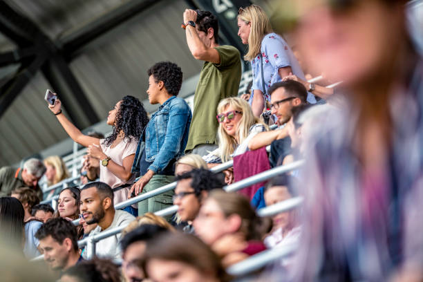 istock African-American woman taking a selfie on a stadium 1129484499