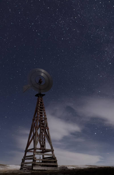 istock A windmill turns on a Wyoming winter's night 1129488143
