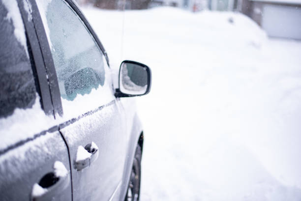 istock Car parked in a lot of snow 1129488945