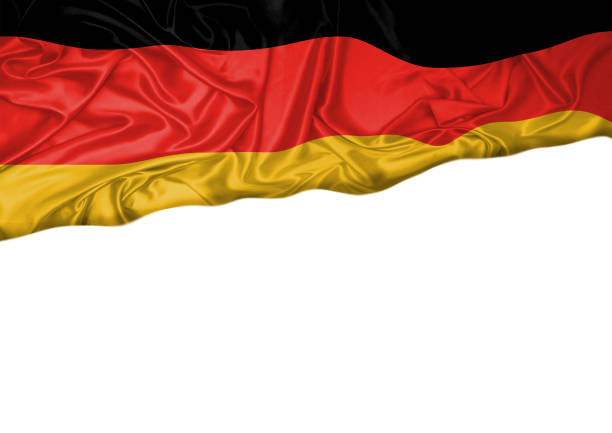 istock National flag of Germany hoisted outdoors with white background. Germany Day Celebration. Front view 1129489008