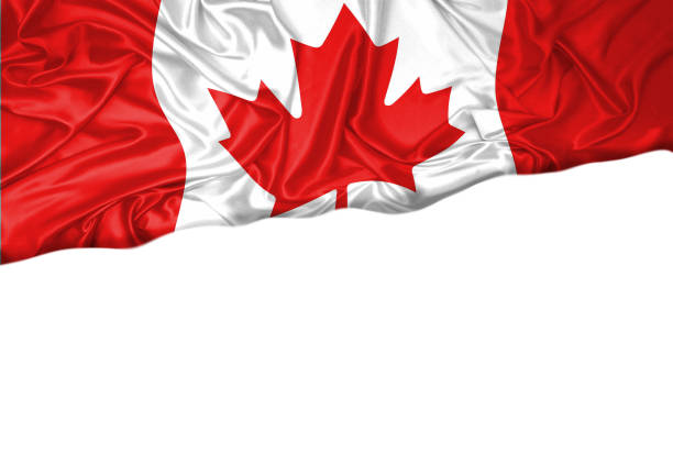 istock National flag of Canada hoisted outdoors with white background. Canada Day Celebration. Front view 1129489020