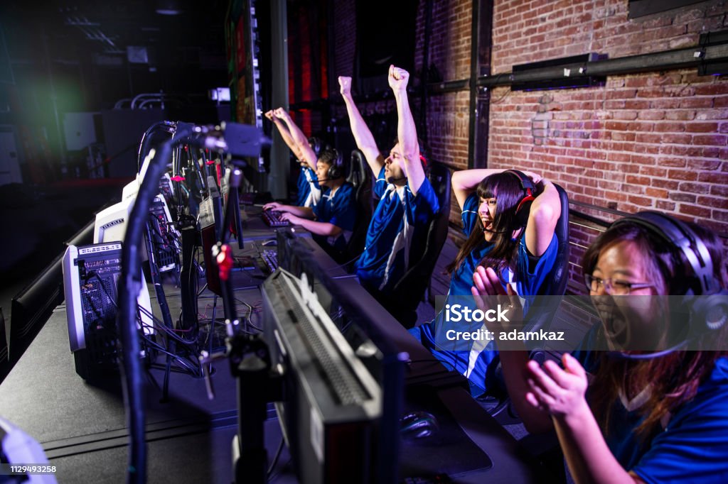 Esports Team Winning the Match Young professional esports players playing games eSports Stock Photo