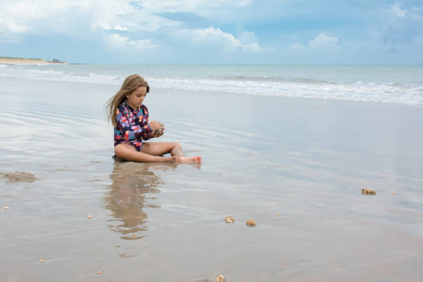 istock Children play on the beach during the holidays 1129501709