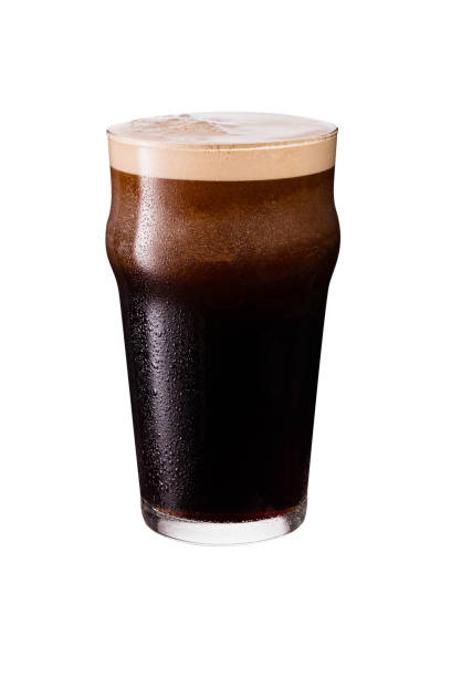 Refreshing Dark Stout Craft Beer on White Refreshing Dark Stout Craft Beer on White with a Clipping Path porter photos stock pictures, royalty-free photos & images