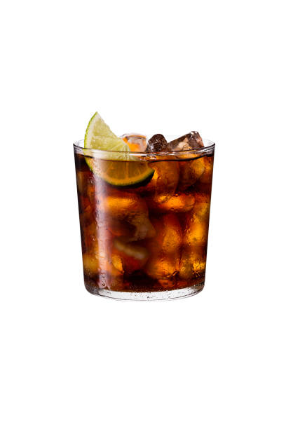 Refreshing Rum and Cola Cocktail on White Refreshing Rum and Cola Cocktail on White with a Clipping Path rum stock pictures, royalty-free photos & images