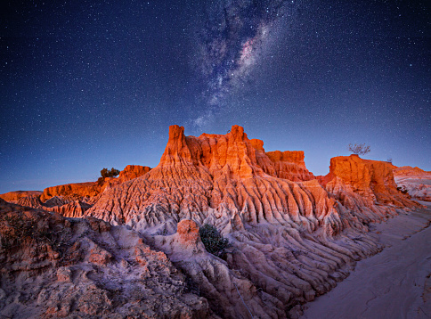 Starry skies over desert landscape in remote outback Australia