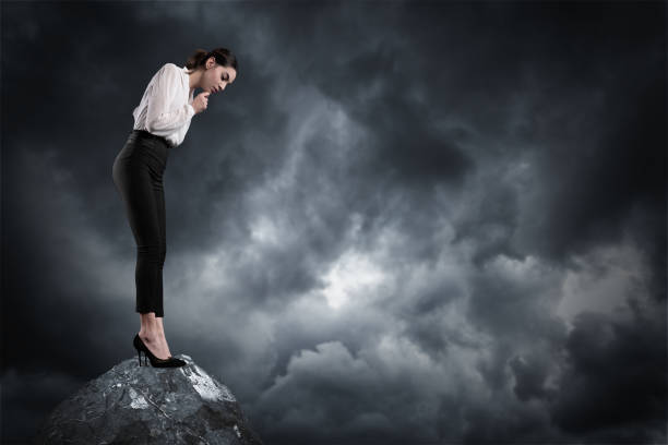 istock Businesswoman looking down 1129511398