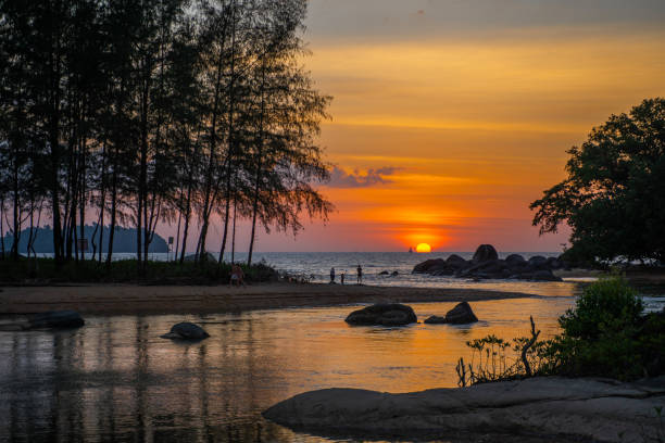 istock beautiful sunset at the beach 1129514287