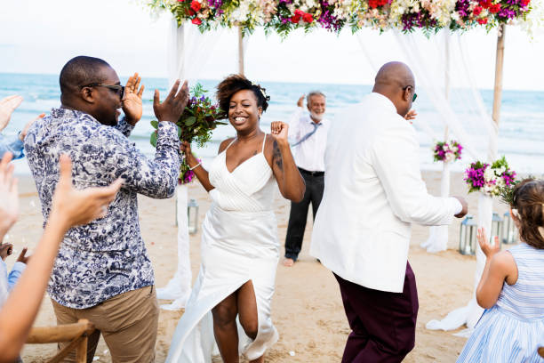 istock African American couple getting married at the beach 1129515850