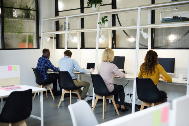istock Business people sitting in row 1129517422