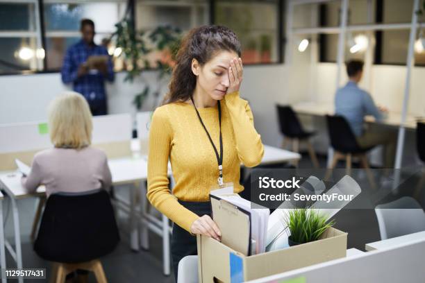 Packing Stuff After Firing Stock Photo - Download Image Now - Being Fired, Downsizing - Unemployment, Unemployment