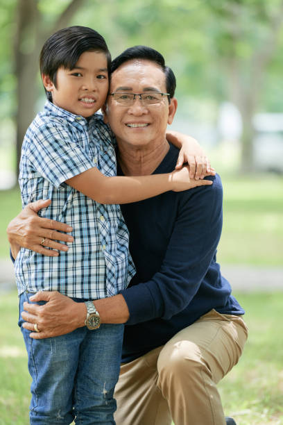 istock Senior man with grandson 1129522070