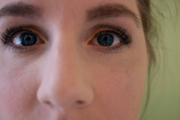 istock women portrait after applying makeup. nice lips and blue eyes 1129524079