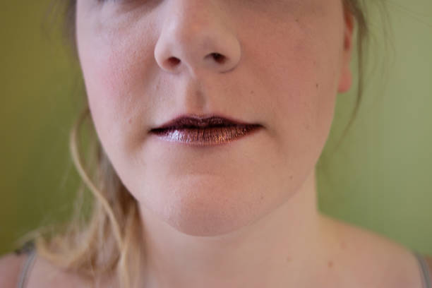 istock women portrait after applying makeup. nice lips and blue eyes 1129524082