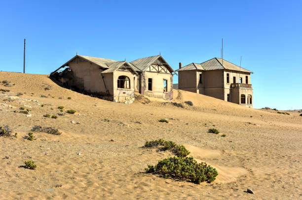 Ghost town Kolmanskop, Namibia The abandoned ghost diamond town of Kolmanskop in Namibia, which is slowly being swallowed by the desert. kolmanskop namibia stock pictures, royalty-free photos & images
